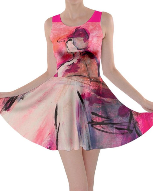  A  pink dress with a vibrant, original art print by Leeorah, designed to flatter all sizes. The dress features a relaxed silhouette and soft fabric, promising comfort and style for any occasion.Front view