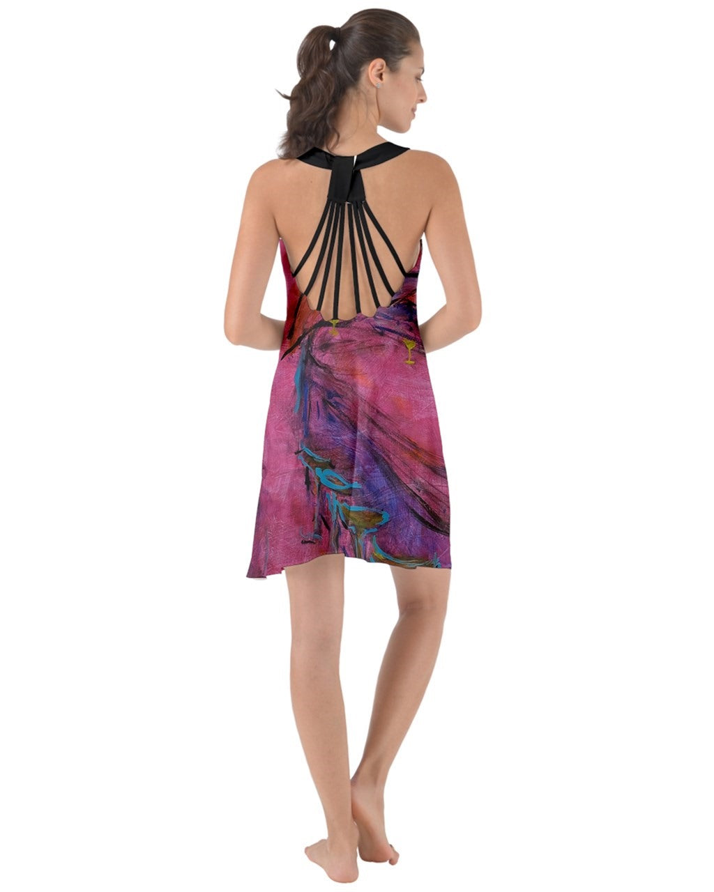 A captivating pink swirling dress featuring criss-cross back straps, adorned with original art by Leeorah. The fabric gracefully flows, accentuating movement with its seductive design .Be the star on the dance floor .Back view