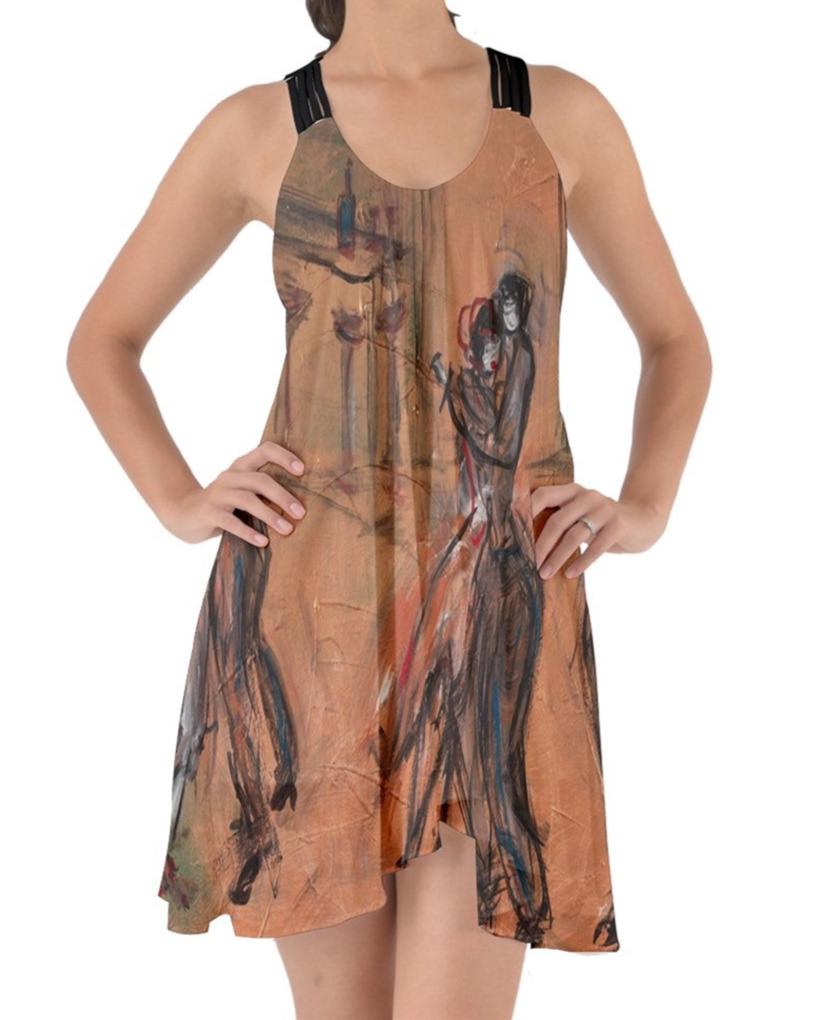 A captivating swirling dress featuring criss-cross back straps, adorned with original art by Leeorah. The fabric gracefully flows, accentuating movement with its seductive design .Front view . 